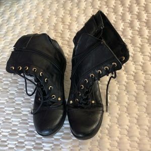 A pair of DY Guess Boots